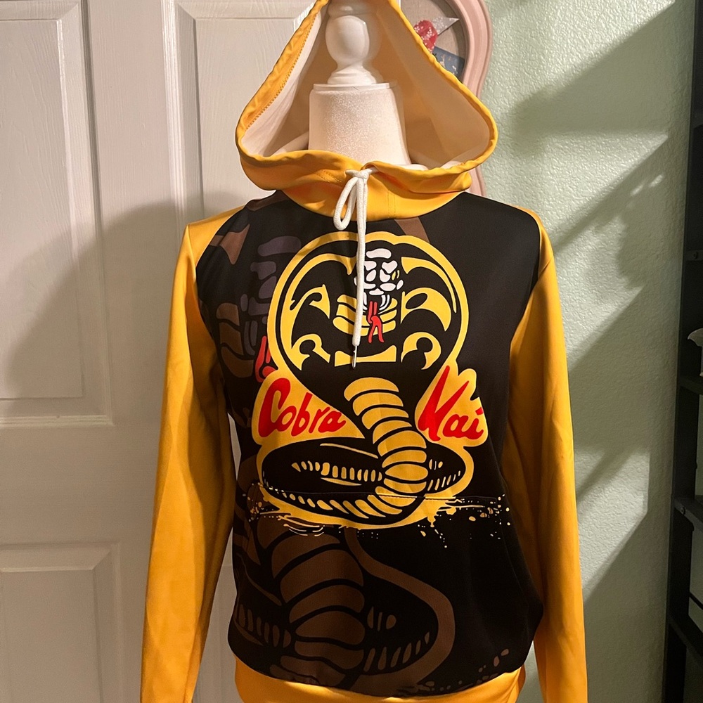 Cobra Kai Men's Yellow and Black Hoodie Sweater